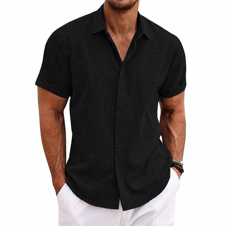 Stylish men's short sleeve summer shirt featuring a lapel collar and easy button front closure.