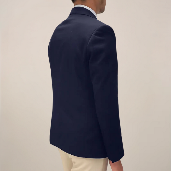 Versatile men's spring tailored navy blazer. Ideal for smart casual, business, or sophisticated everyday men's fashion.