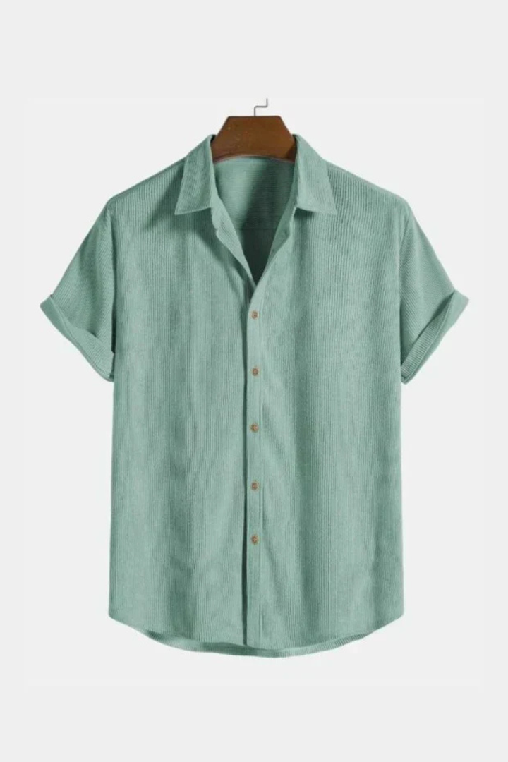 Casual men's textured short sleeve shirt with a camp collar and button-down front, great for summer fashion.