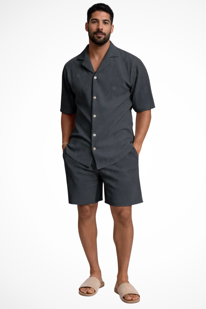 Close-up of the textured fabric on the men's summer shirt and shorts matching set. Casual & breathable.