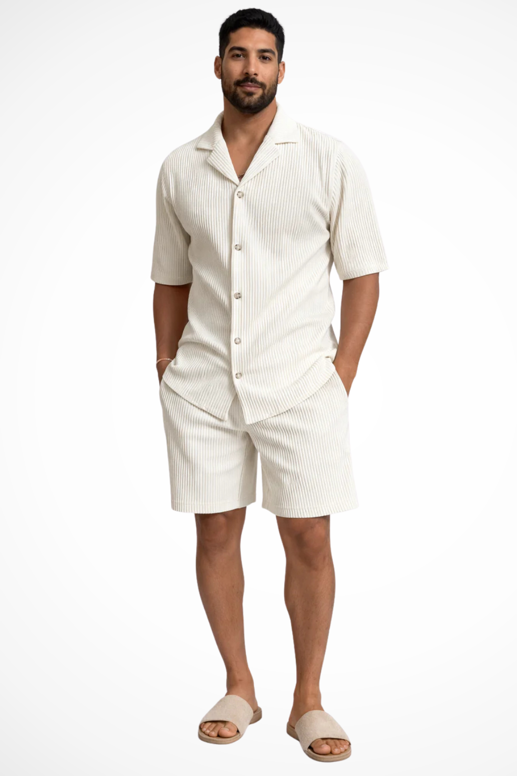Men's coordinated textured summer outfit. Short-sleeve button-up shirt & shorts, made for warm weather comfort.