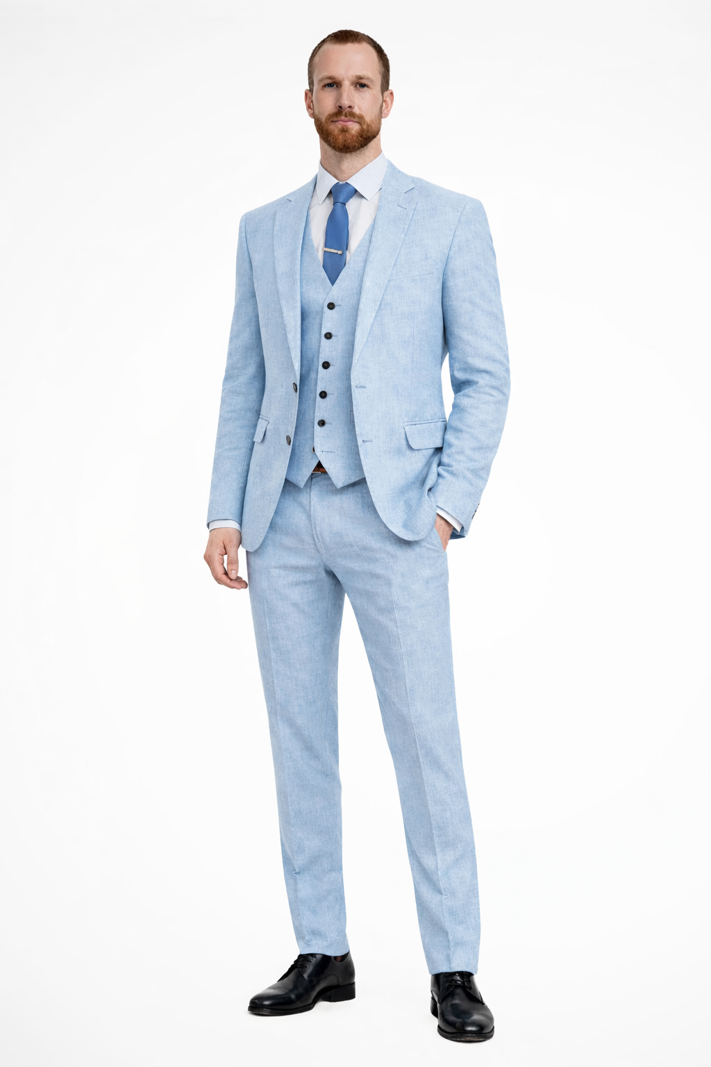 Premium men's formal wear: a three-piece wedding guest suit including a sharp blazer, waistcoat, and trousers.