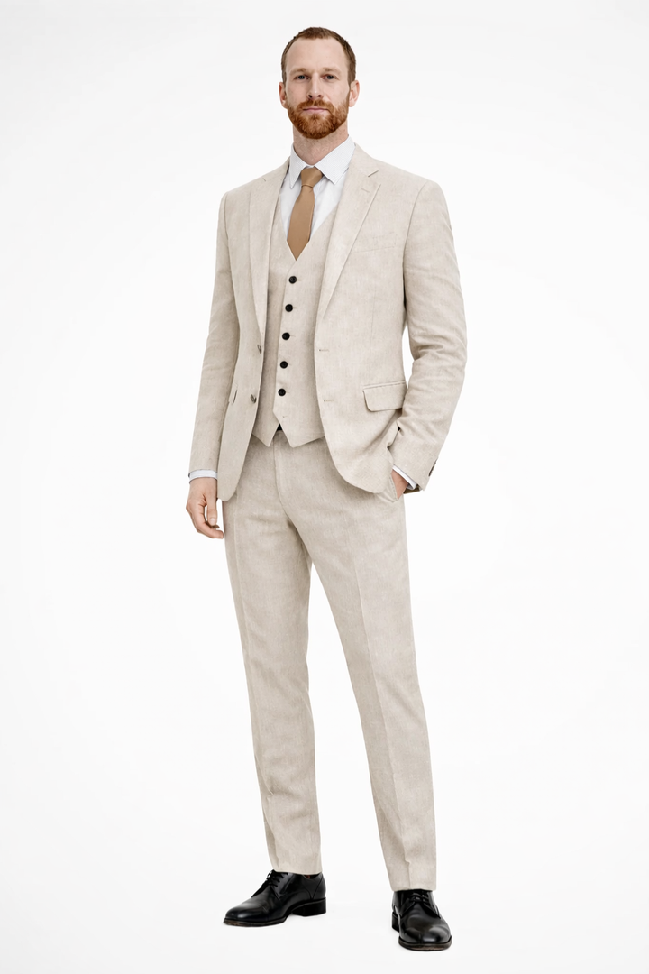 Modern men's fashion three-piece suit set with a sleek blazer, trousers, and waistcoat, perfect for weddings.