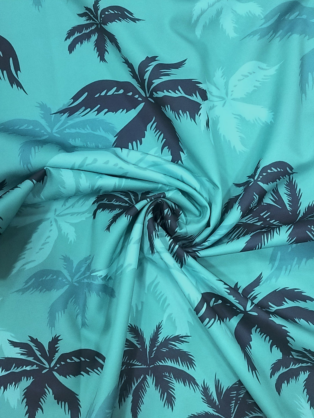 Casual men's short sleeve tropical palm tree print shirt, perfect for warm weather and beach vacations.