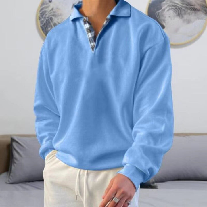 Casual men's long sleeve polo sweater, perfect for modern everyday style. Versatile, comfortable & relaxed fit.