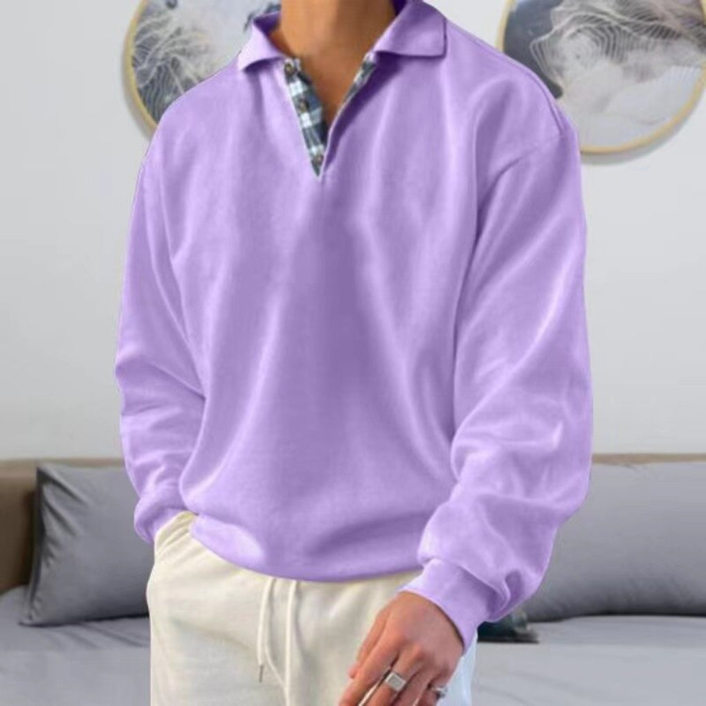 Modern men's long sleeve polo sweater with a relaxed fit. Stylish and versatile for casual everyday wear.