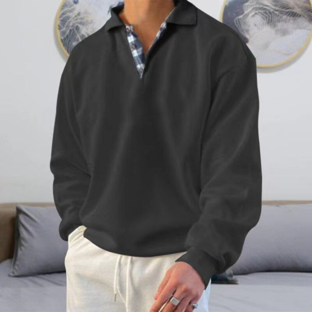 Versatile men's long sleeve polo sweater. Achieve a stylish, modern look with this comfortable everyday top.