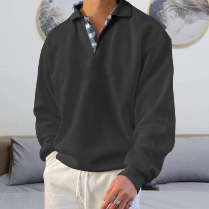 Versatile men's long sleeve polo sweater. Achieve a stylish, modern look with this comfortable everyday top.