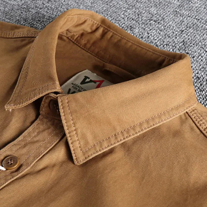 Khaki men's casual long sleeve utility shirt, designed for comfort & effortless style in modern men's apparel.