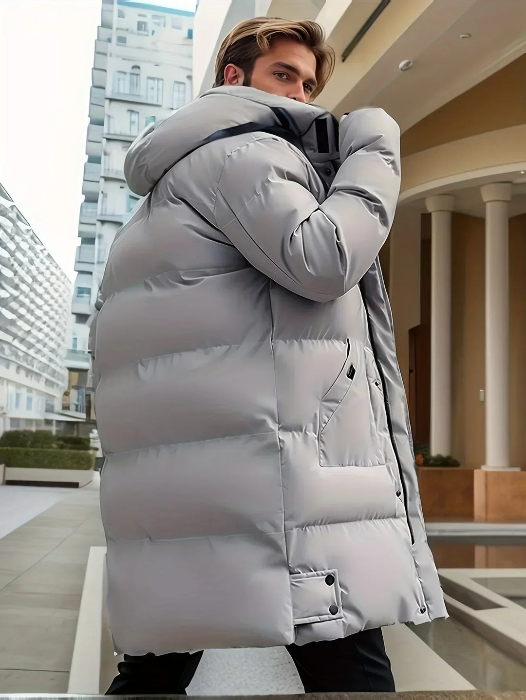 Insulated men's warm puffer coat with hood. Essential quilted winter jacket for cold weather outerwear.
