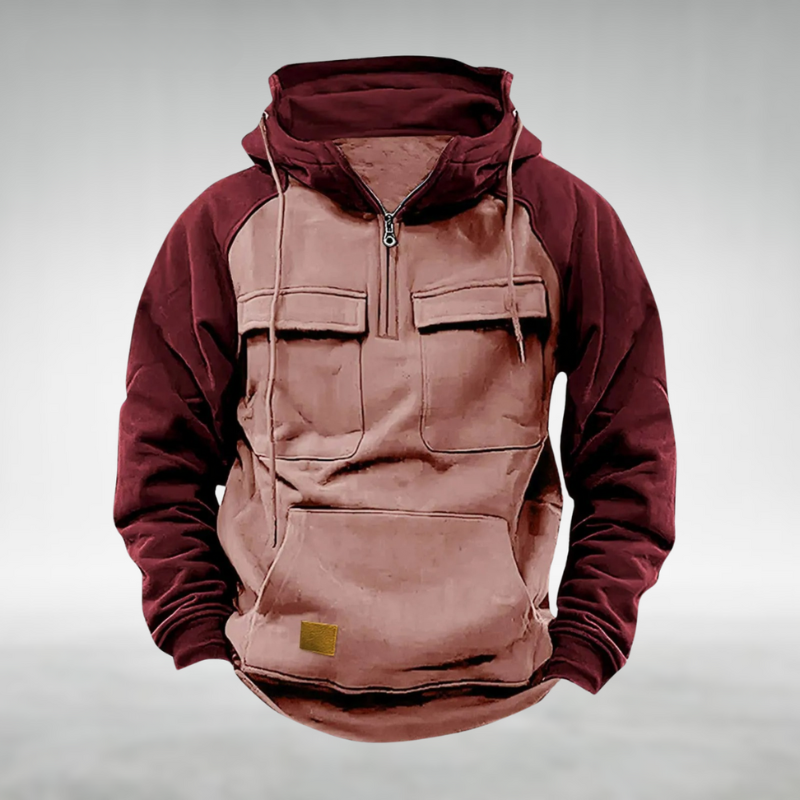 Man wearing a comfortable men's two-tone winter hoodie, ideal for outdoor adventure & casual style.
