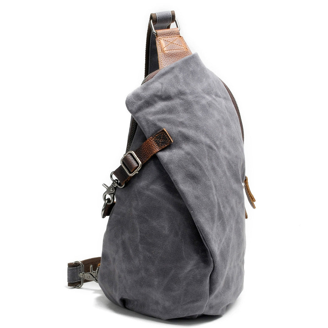 High-quality canvas men's crossbody bag with water-resistant finish & anti-theft features.