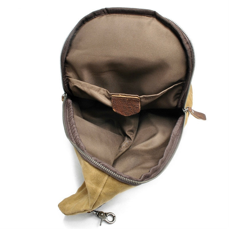 Secure men's anti-theft crossbody bag in canvas, with hidden pocket for valuables.