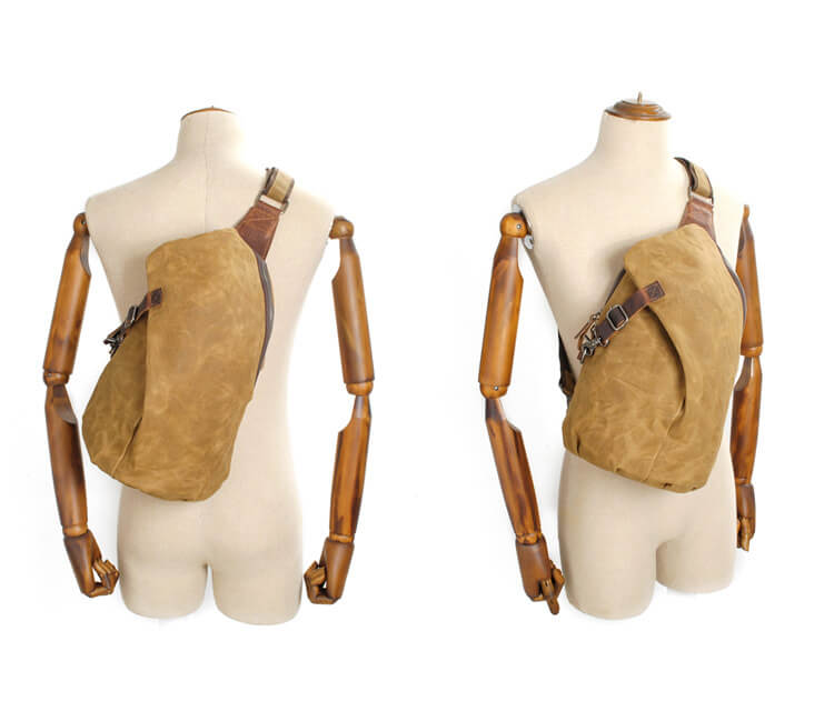 Interior of men's canvas crossbody bag, showing multiple compartments for organizing essentials.