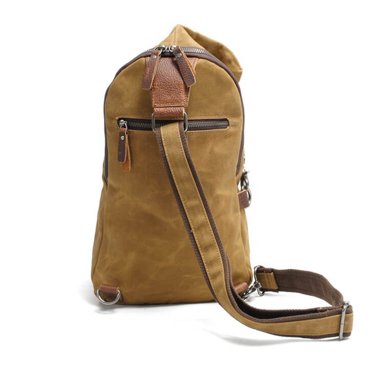 Compact men's water-resistant canvas crossbody bag, ready for daily essentials & travel.