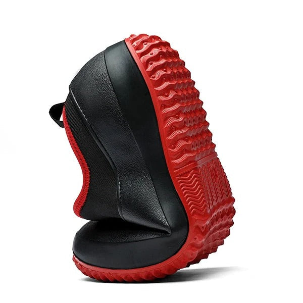 Black waterproof slip-on work shoes for men, ensuring comfort and non-slip protection in professional environments.