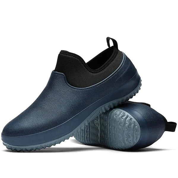 Professional men's waterproof slip-on safety footwear, offering durable, non-slip comfort for various work conditions.