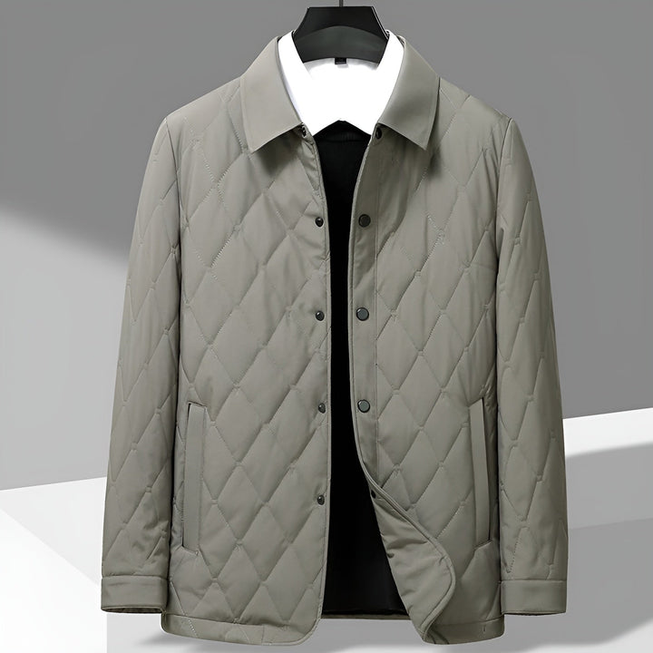Men's classic quilted button-down jacket for versatile casual or transitional autumn/winter layering. Diamond quilted outerwear.