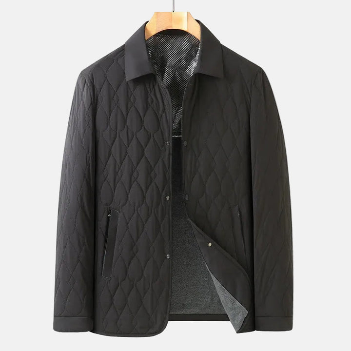 Durable men's quilted button-down jacket, offering warmth and classic style for autumn and mild winter weather.