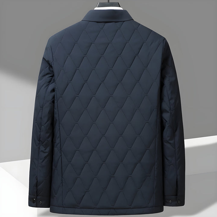 Man wearing a classic quilted button-down jacket, perfect for stylish autumn layering and casual everyday outfits.