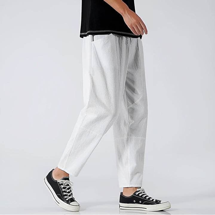 Back view of men's relaxed fit cropped chinos, perfect for a relaxed, comfortable and casual summer look.