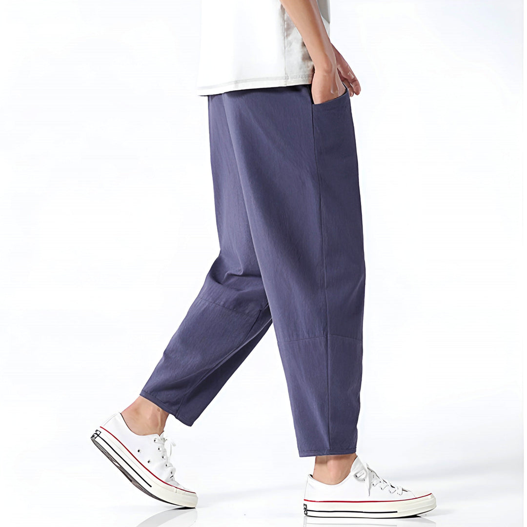 Stylish men's relaxed fit cropped chinos in a comfortable fabric, ideal for modern casual summer wear.