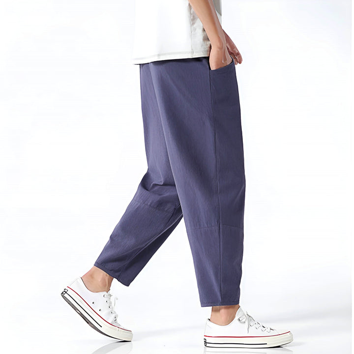 Stylish men's relaxed fit cropped chinos in a comfortable fabric, ideal for modern casual summer wear.