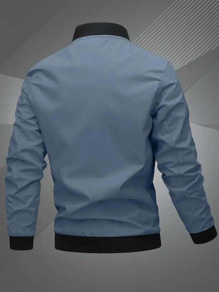 Back view of men's lightweight bomber jacket, showcasing regular fit & ribbed hem.