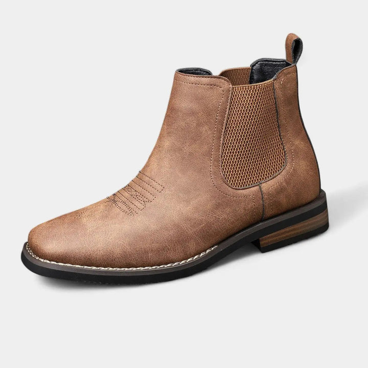 Stylish men's black leather Chelsea boots with elastic sides & pull tabs. Perfect for smart casual wear.