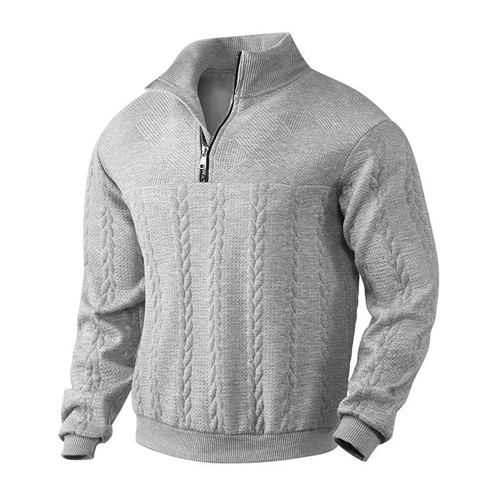 Men's cable texture quarter-zip pullover. Classic smart casual jumper for versatile winter layering.