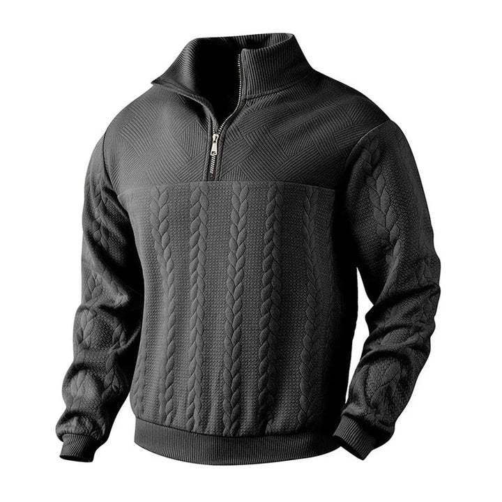 Men's quarter-zip pullover with distinctive cable texture. A classic, versatile piece for effortless winter styling.