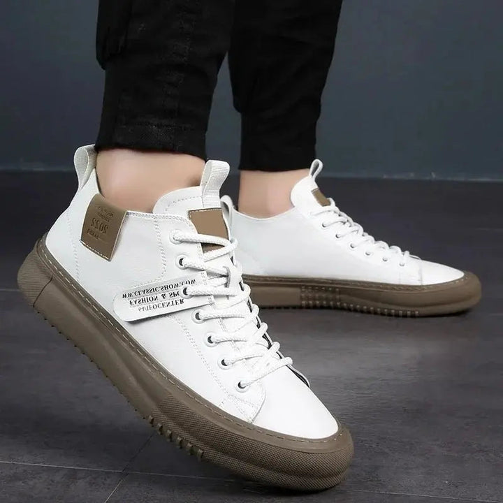 Black canvas high-top trainers for men. Lace-up casual shoes with athletic design, perfect for street style & comfort.