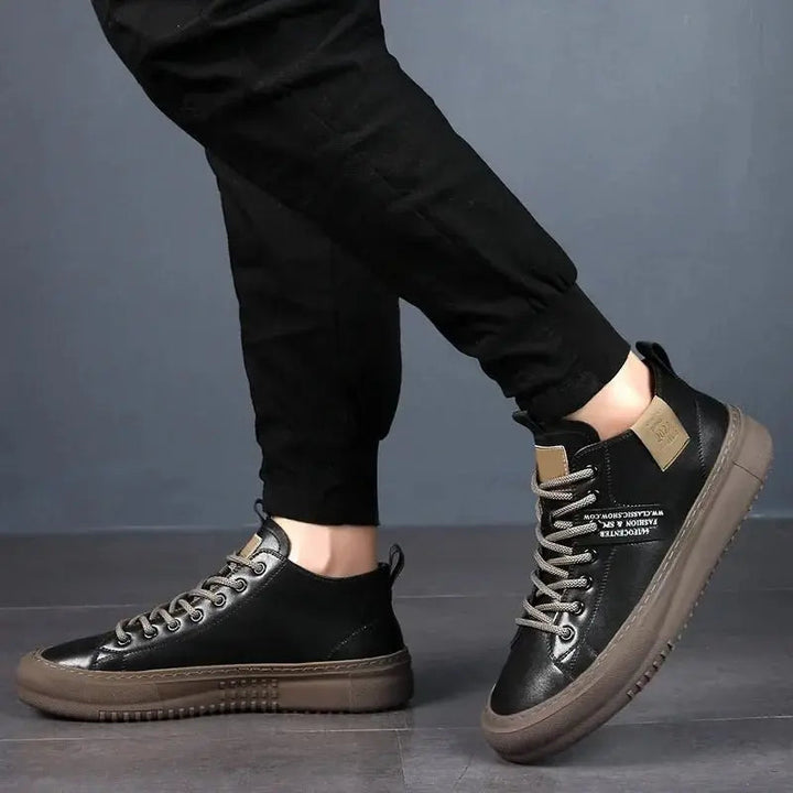 Comfortable men's high-top canvas trainers. Lace-up casual shoes in black, perfect for everyday street style footwear.
