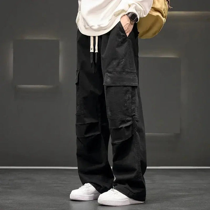 Beige men's straight leg cargo pants, versatile utility trousers with ample pockets for daily casual fashion.