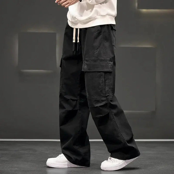 Durable men's straight leg cargo trousers, perfect outdoor pants & workwear with multiple spacious pockets.