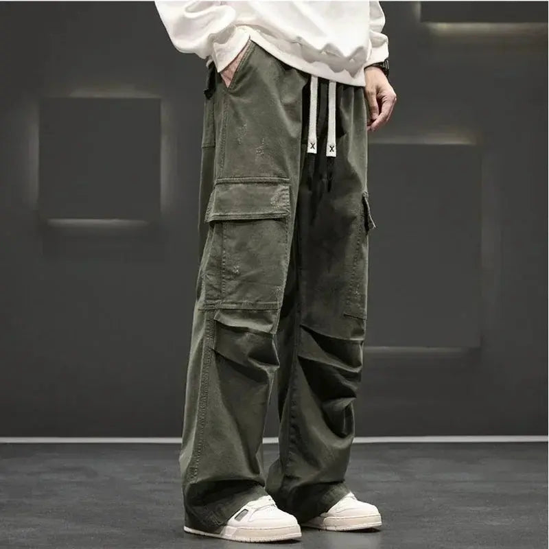 Fashionable men's straight leg cargo pants in various colors, offering style & utility with many pockets.