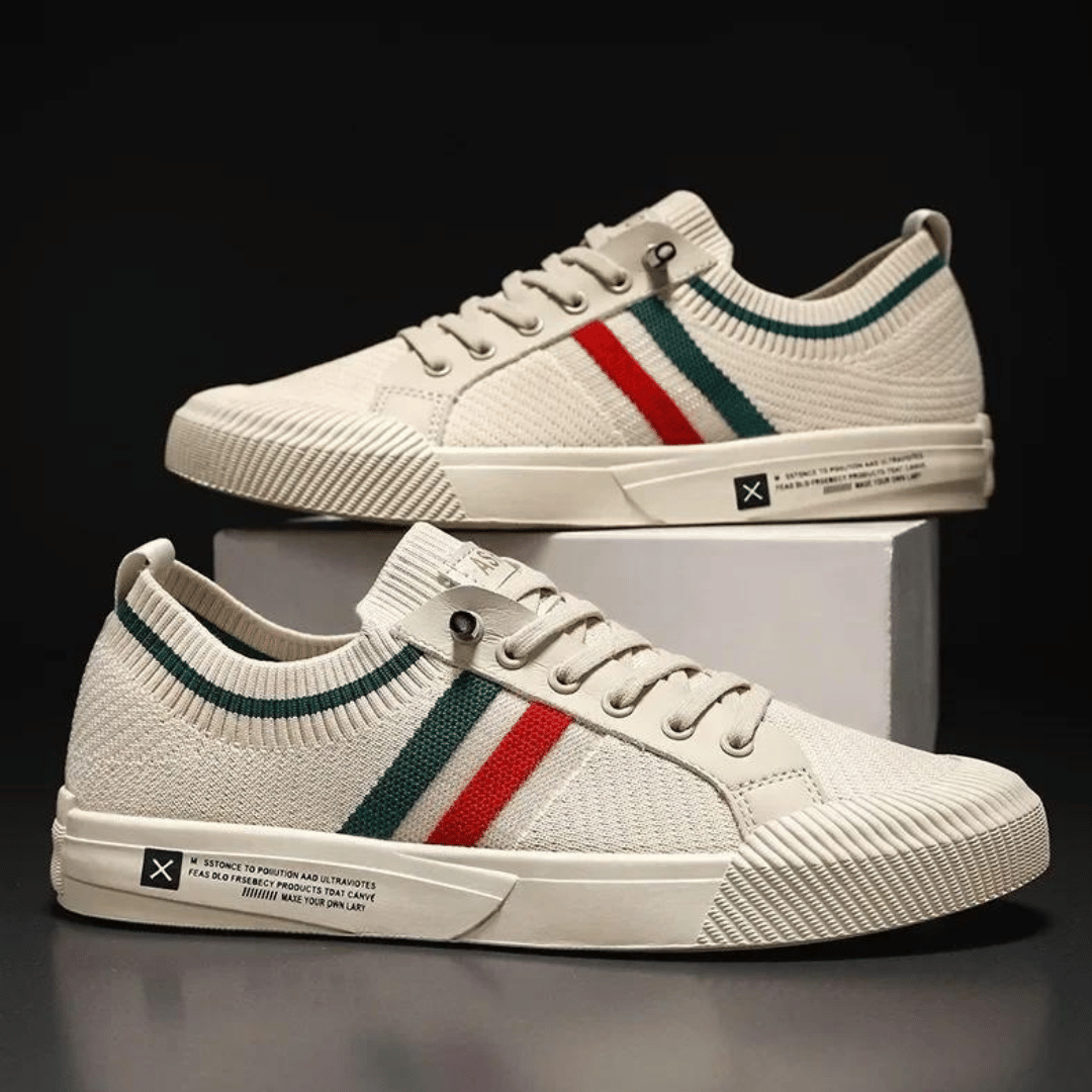 "Men’s casual sneakers in breathable knit fabric, lace-up design with durable rubber sole, perfect for everyday comfort."