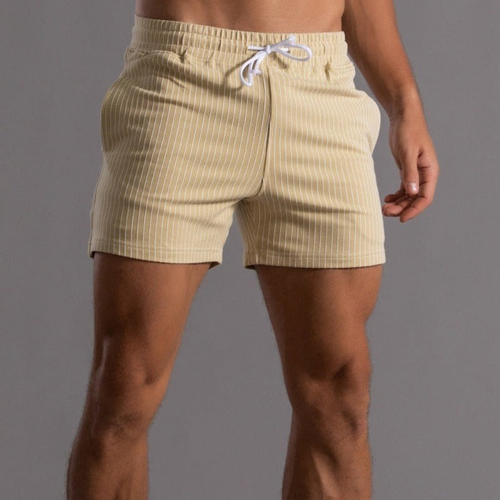 Men's casual yellow striped shorts with elastic waistband