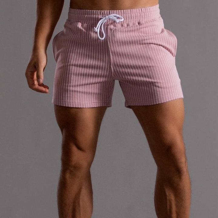 Men's casual pink striped shorts with elastic waistband