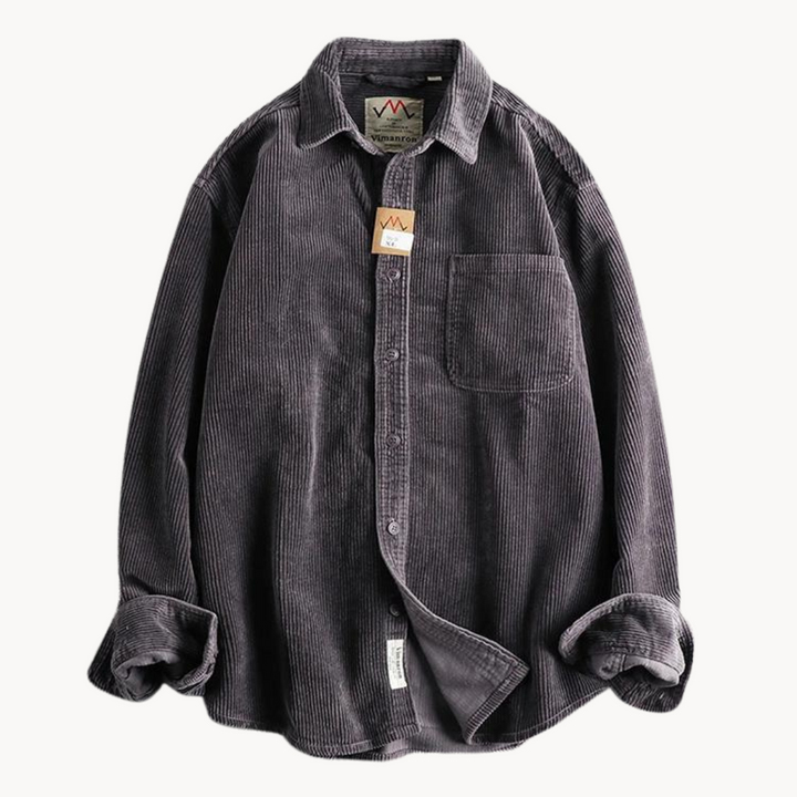 Men's classic orange corduroy shirt with button-down front and textured fabric, ideal for layering and timeless style.