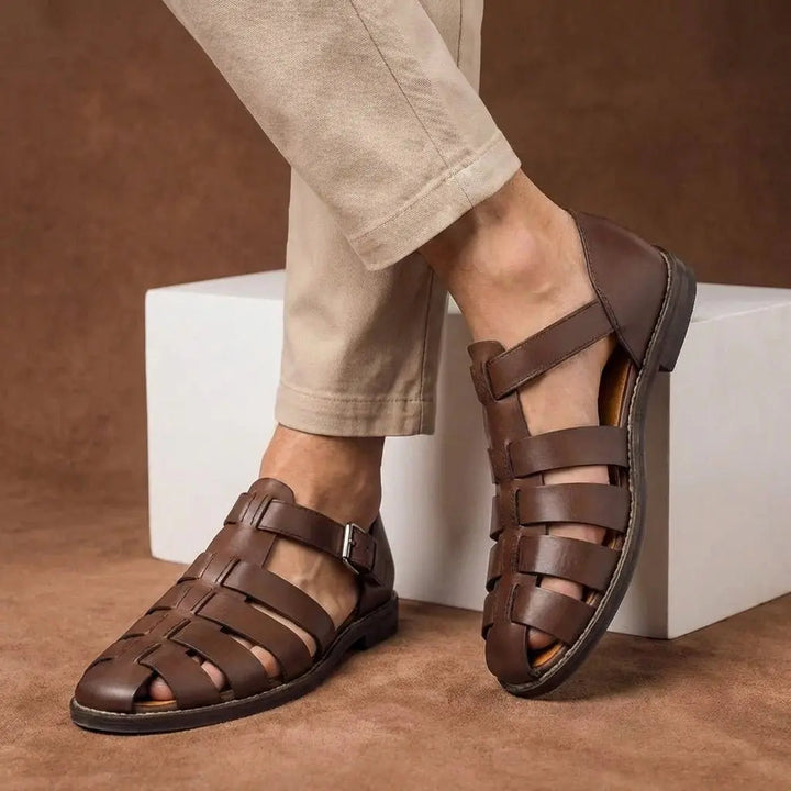 Durable men's closed-toe fisherman sandals with flat sole & buckle strap, ideal for walking, comfort & outdoor style.