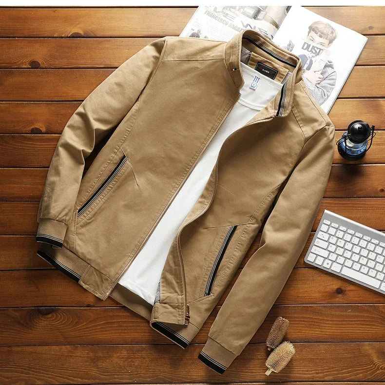 "Men's cotton bomber jacket with stand-up collar, ribbed cuffs, windproof, lightweight, perfect for spring and autumn wear."