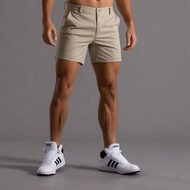 Men's cotton knee-length chino shorts in khaki, featuring a classic summer design and breathable material, ideal for casual w
