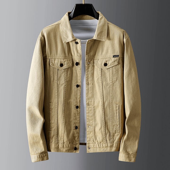 "Men's denim jacket front view with button-front closure, classic spread collar, and premium cotton fabric for style and comf