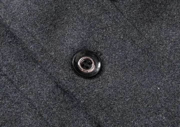 Tailored men's double-layer winter coat, mid-length, single-breasted. Smart design with integrated knit collar detail.