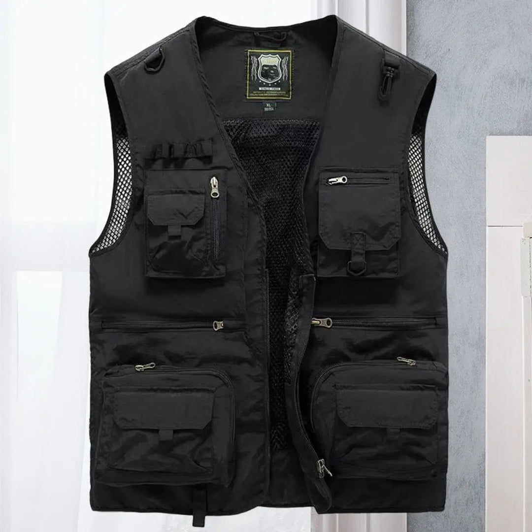Man casting a line, wearing a practical multi-pocket outdoor fishing vest for convenience.