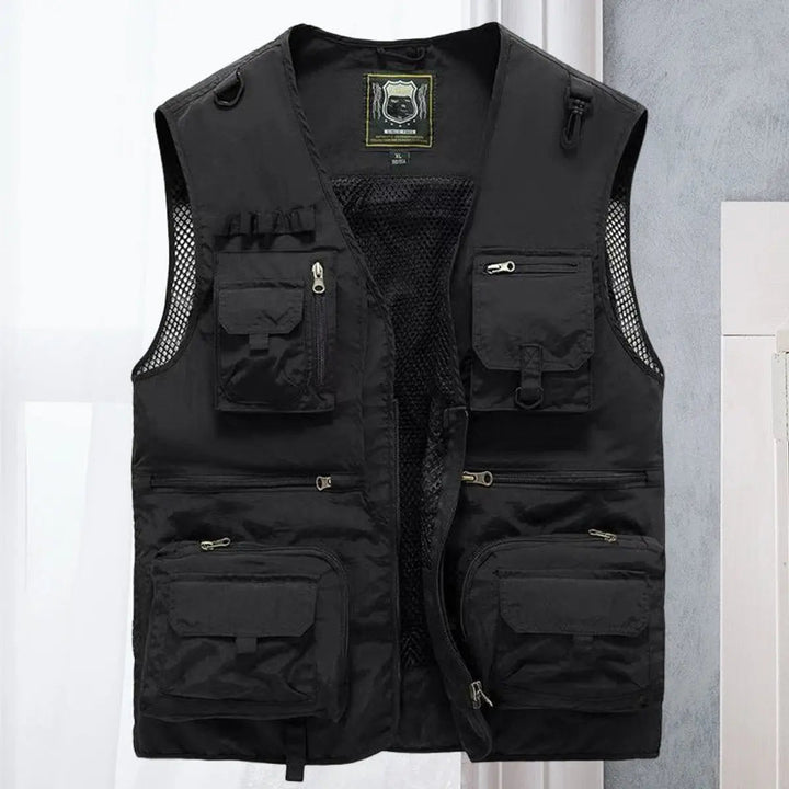 Man casting a line, wearing a practical multi-pocket outdoor fishing vest for convenience.