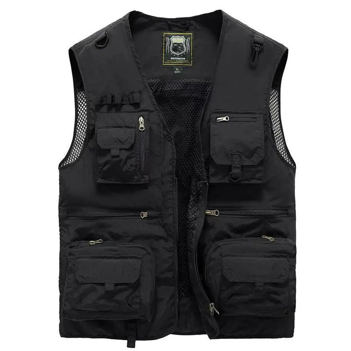 Side view of men's utility vest, showcasing functional pockets & robust construction for outdoor use.