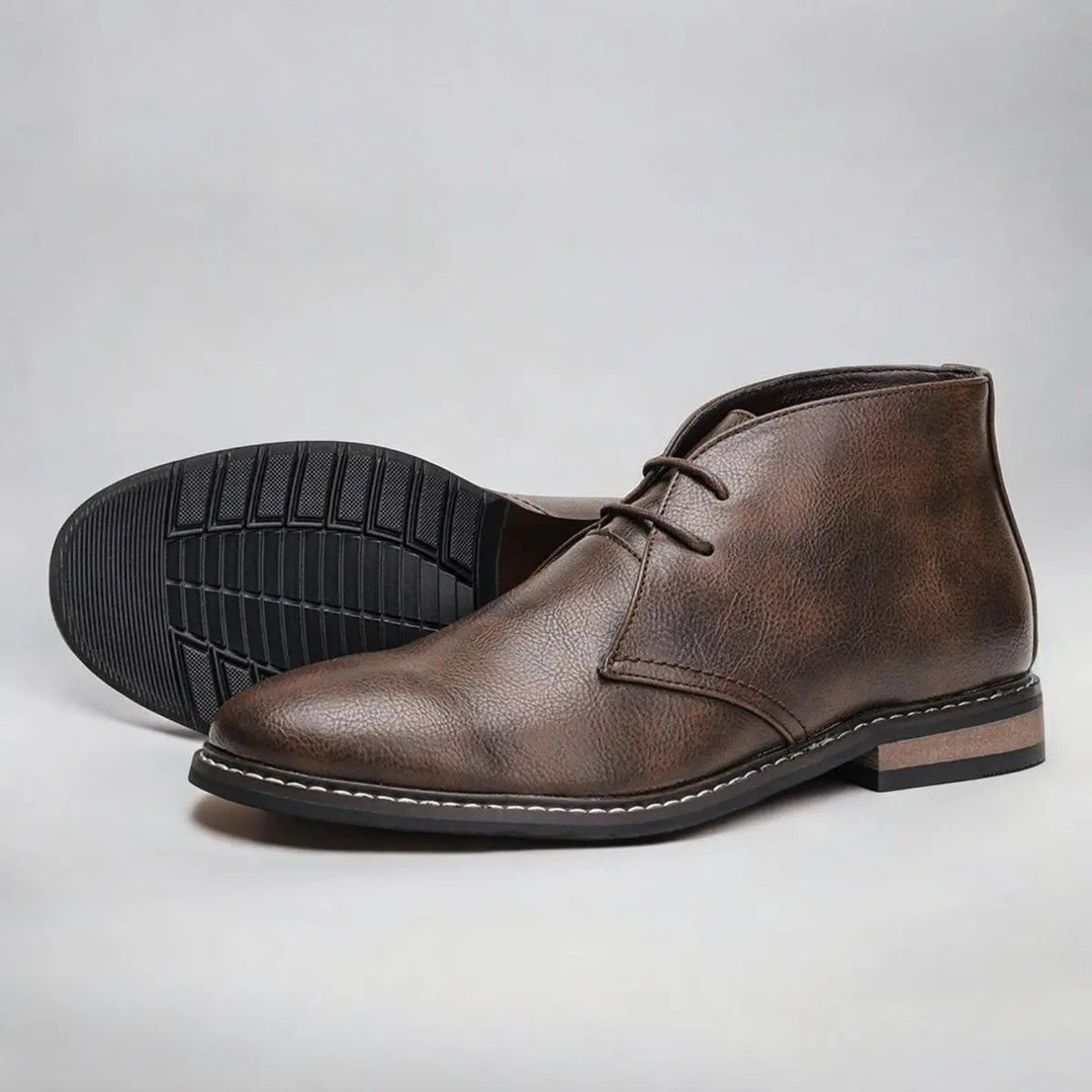 Sophisticated men's chukka dress boots, lace-up design for a smart-casual look. Essential ankle footwear.