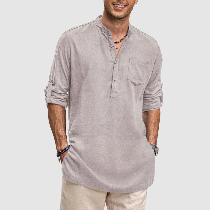 "Men's long sleeve Henley shirt with roll-up sleeves, chest pocket, and classic neckline, front view."